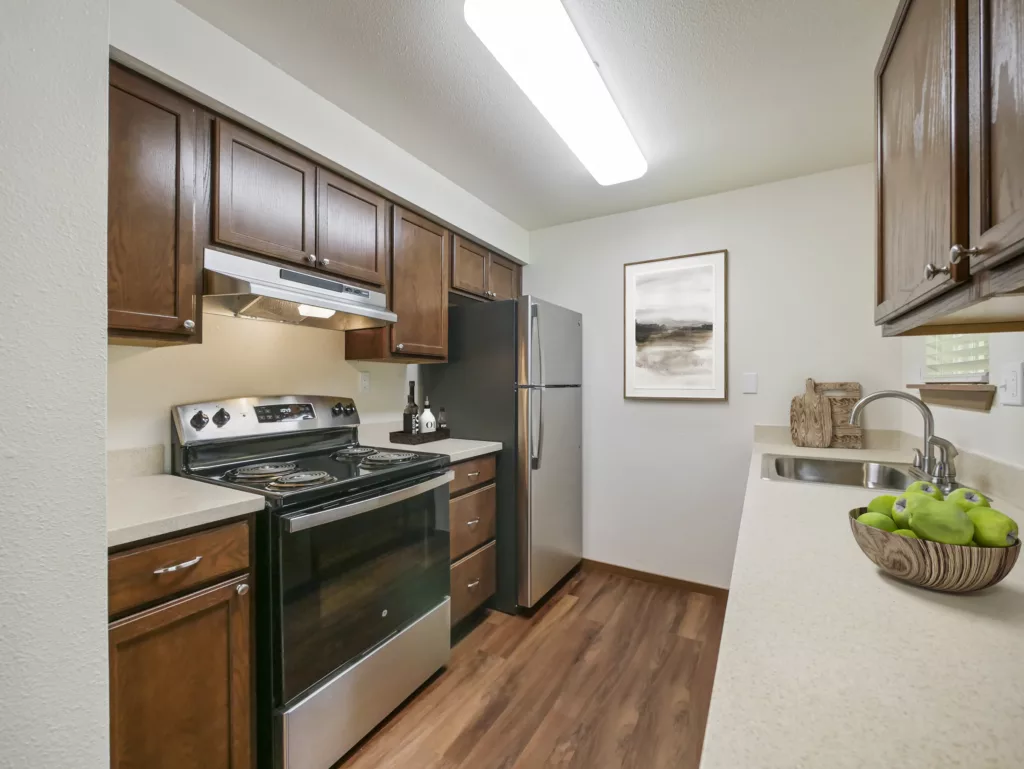 Kitchen at Benson Village apartments in Kent, WA